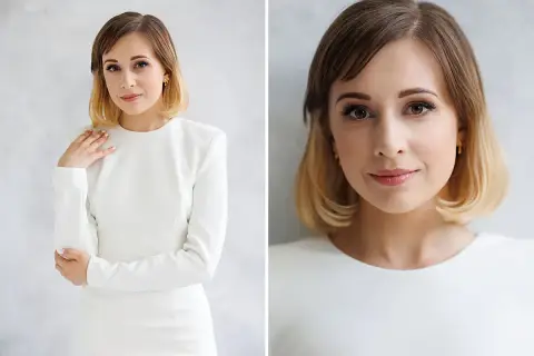 Elegancka kobieta w białej sukience, subtelnie dotykająca ramienia. Idealny przykład, jak pozować do zdjęć, by wyglądać naturalnie i pewnie.